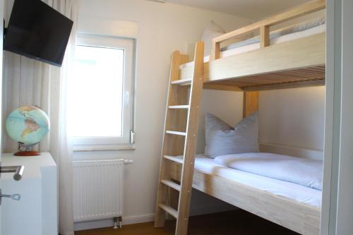 Ένα ή περισσότερα κρεβάτια σε δωμάτιο στο Kaikante