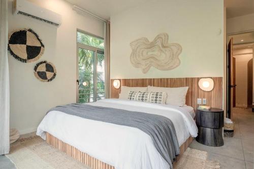 Katil atau katil-katil dalam bilik di Om at Namaste Oasis Condo