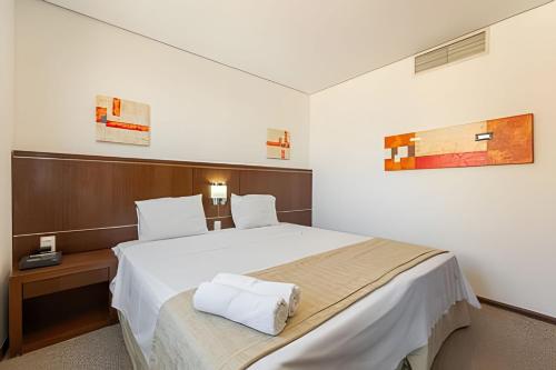 Postel nebo postele na pokoji v ubytování Hospedez - Flats New Osasco Trade Center