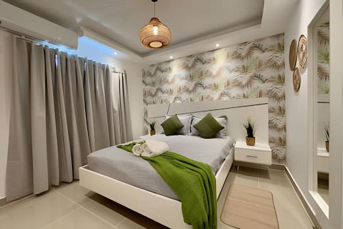 Postel nebo postele na pokoji v ubytování Modern Retreat in Punta Cana