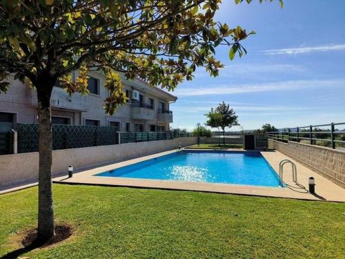 Apartamento con piscina en Playa de A Lanzada
