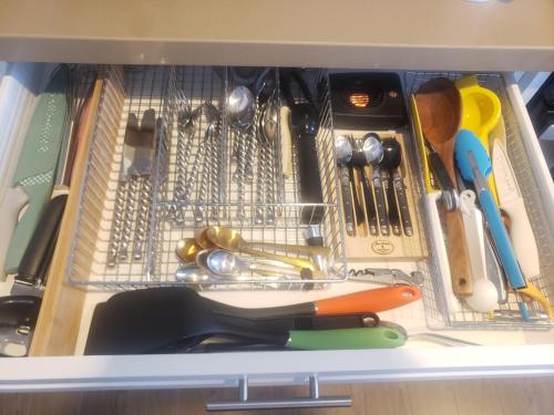 a drawer filled with lots of kitchen utensils at Penthouse Dreams in Irvine