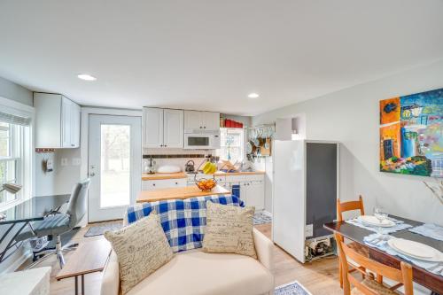 a kitchen and living room with a couch and a table at Less Than 1 Mi to Wineries Quaint and Cozy Waterford Studio in Waterford