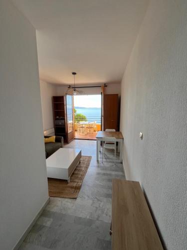un salon avec vue sur l'océan dans l'établissement Mariana - Balcony Sea view Sanguinaires - by TGB, à Ajaccio