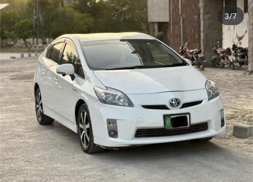 White car - TOYOTA PRIUS MODEL 2010