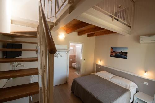 Postel nebo postele na pokoji v ubytování Agriturismo B&B Vista Parco