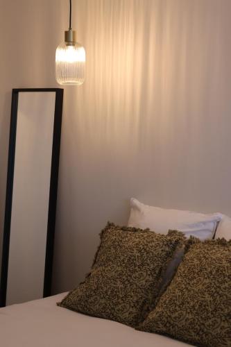 Postel nebo postele na pokoji v ubytování Maison Bello - Rétro