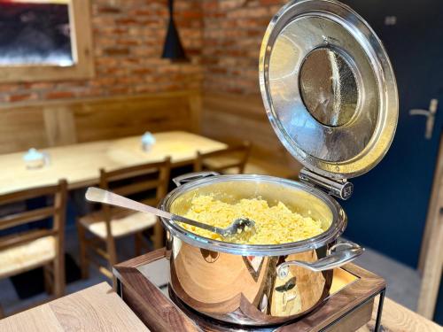 a scale sitting on top of a table with food at Pension U Studny in Harrachov