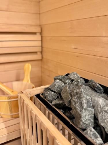 a crate of rocks in a sauna at Hotel de Maître de Vaughan in Brussels