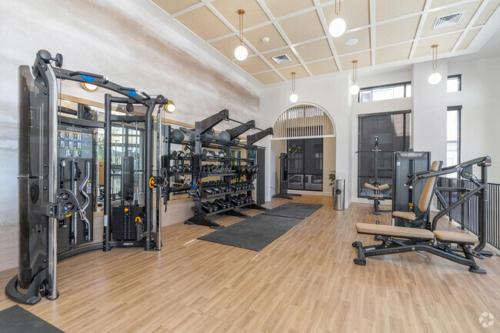 a gym with several treadmills and machines in a room at Luxury 1BEDROOM 1BATH SLABTOWN-PEARL in Portland