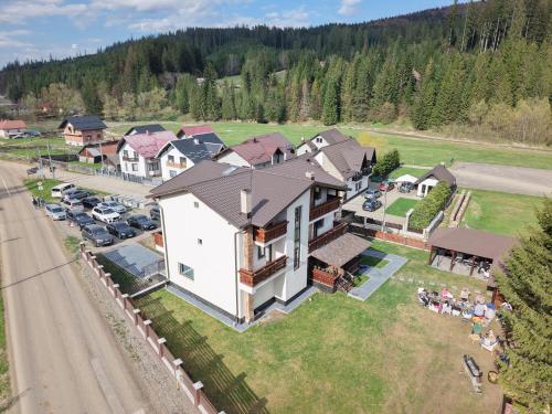 an aerial view of a large house at Pensiunea La Ancuța-n Bucovina in Voronet