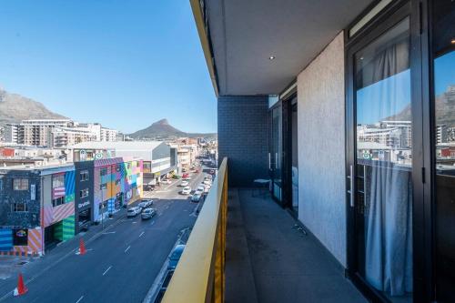 a balcony of a building with a view of a street at Amazing Views in the WEX in Cape Town