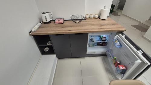 Kuchyň nebo kuchyňský kout v ubytování AdriaMont - Rooms & Coworking
