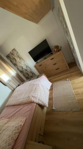 Llit o llits en una habitació de Le paradis d'Emy