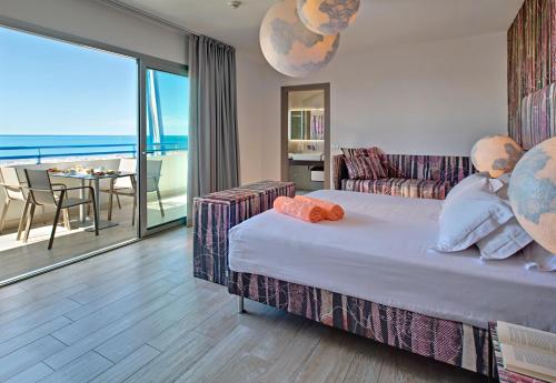 Кровать или кровати в номере Bibione Palace Hotel