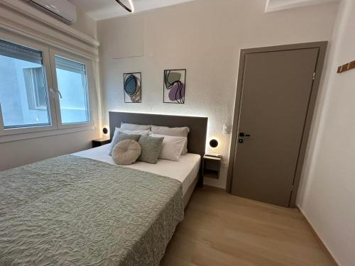 Ένα ή περισσότερα κρεβάτια σε δωμάτιο στο Grand Star Suite City Central