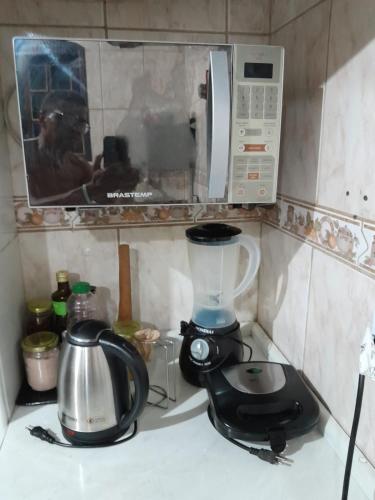 Kuchyň nebo kuchyňský kout v ubytování Refúgio Aconchegante-Itaboraí,RJ
