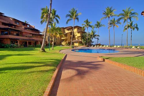 Bazén v ubytování Hermoso alojamiento en los Tules, frente al mar en medio de hermosos jardines, es Unico!!! nebo v jeho okolí