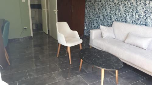 Un lugar para sentarse en Hotel Parc Les Cigognes