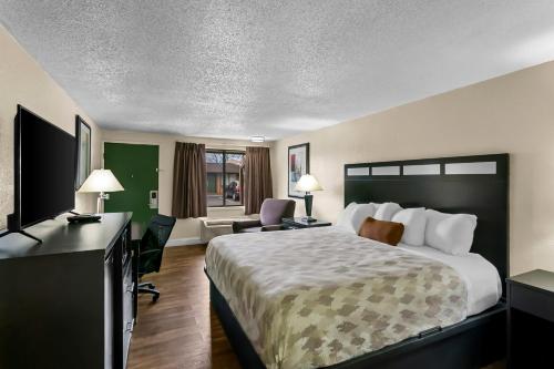 Ένα ή περισσότερα κρεβάτια σε δωμάτιο στο Americas Best Value Inn Martinsburg