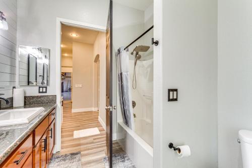 a bathroom with a shower and a sink at Family Hideaway with Hillside Views in Temecula! in Temecula
