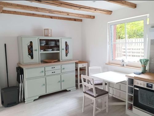 Kuchyň nebo kuchyňský kout v ubytování Ferienhaus Marion