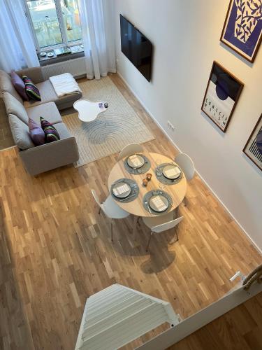TV a/nebo společenská místnost v ubytování Lomma Harbour Apartment