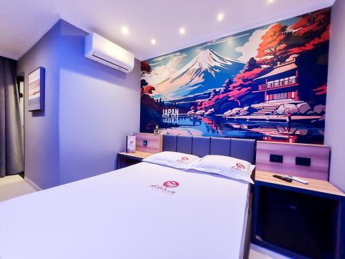 Кровать или кровати в номере Glória Plaza Hotel (Adults Only)