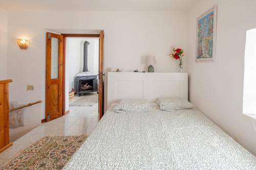 Postel nebo postele na pokoji v ubytování Relais Marmore con Jacuzzi per due persone