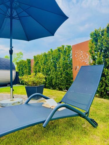 Κήπος έξω από το NEU! Design-FeWo Fleesensee, Wallbox, Terrasse
