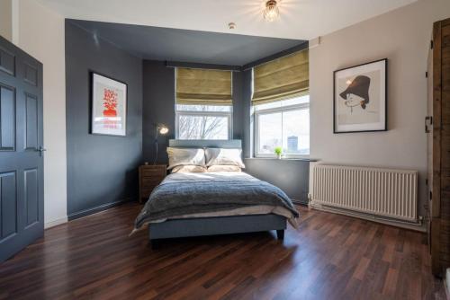 a bedroom with a bed and a window at Park View, Sheffield in Sheffield