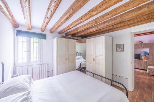 Posteľ alebo postele v izbe v ubytovaní Cà Gamba by Venicevillas, Guglie