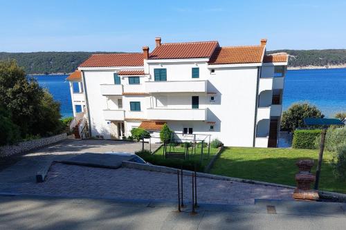 Apartments by the sea Supetarska Draga - Gonar, Rab - 24423