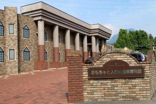 a brick building with a sign in front of it at Hotel An no Ie - Vacation STAY 30000v in Ikaho