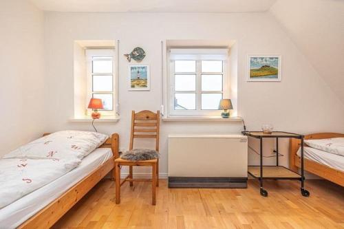 En eller flere senge i et værelse på Hus-Freesland