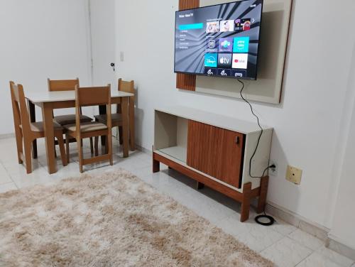 TV a/nebo společenská místnost v ubytování Vislumbrante e Aconchego