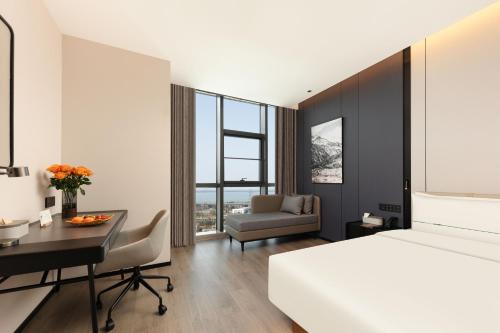 Postel nebo postele na pokoji v ubytování Atour Hotel Suzhou Industrial Park Fengting Avenue