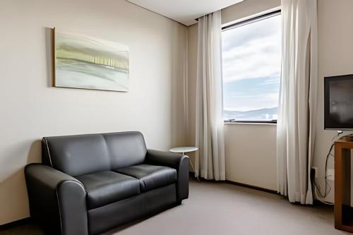 TV a/nebo společenská místnost v ubytování Hospedez - Flats New Osasco Trade Center