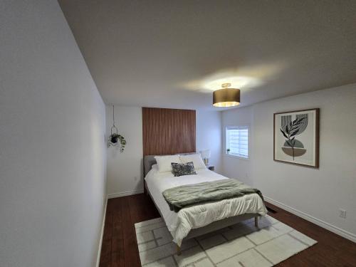 Postel nebo postele na pokoji v ubytování Luxurious waterfront retreat