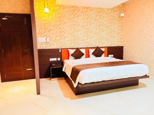 Katil atau katil-katil dalam bilik di Wow Hotels