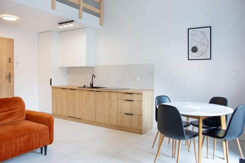 Η κουζίνα ή μικρή κουζίνα στο Fabryka Loft 3A # Nestapartamenty