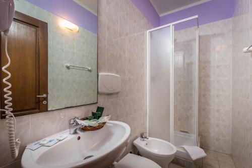 Koupelna v ubytování Hotel Real