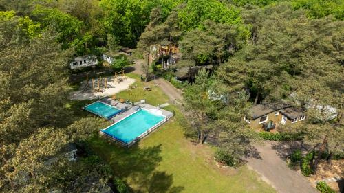 an aerial view of an estate with a swimming pool at Boswilg in Zuidwolde