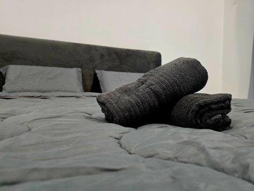 Ένα ή περισσότερα κρεβάτια σε δωμάτιο στο The Cozy 88 ipoh