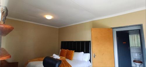 Katil atau katil-katil dalam bilik di Risima guest house
