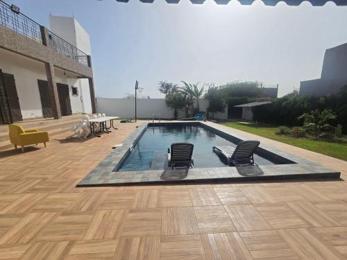 Der Swimmingpool an oder in der Nähe von KËR YAYE FATOU - Toubab Dialaw