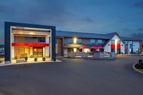 an empty parking lot in front of a hotel at Comfort Inn in Charlottetown