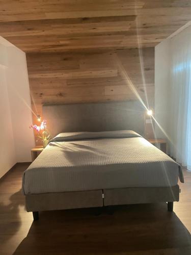 Ένα ή περισσότερα κρεβάτια σε δωμάτιο στο Albergo Silvana