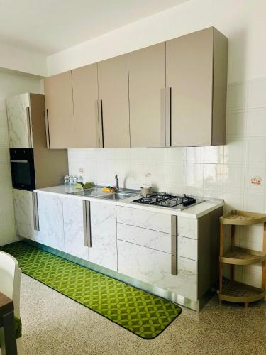 Η κουζίνα ή μικρή κουζίνα στο Casa Vacanza Aria di Mare