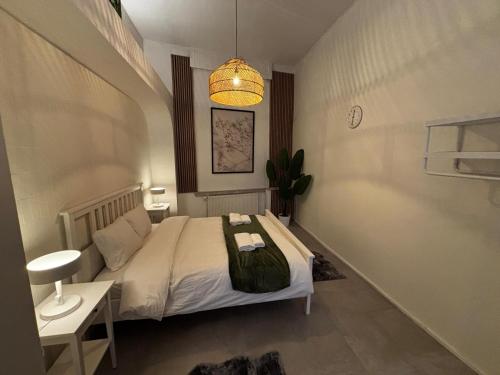 Postel nebo postele na pokoji v ubytování 6 Stylish & Comfortable Studios , Heart of Gent